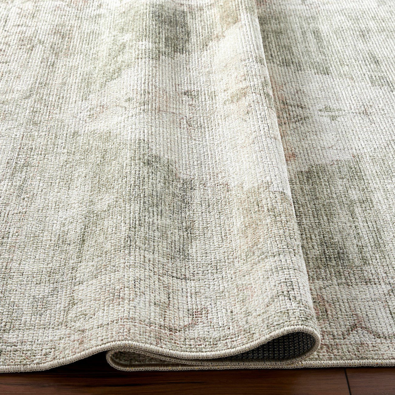 ANIKA Becki Owens x Livabliss Vintage Traditional Oriental Boho Sage Green Area Rug Fold