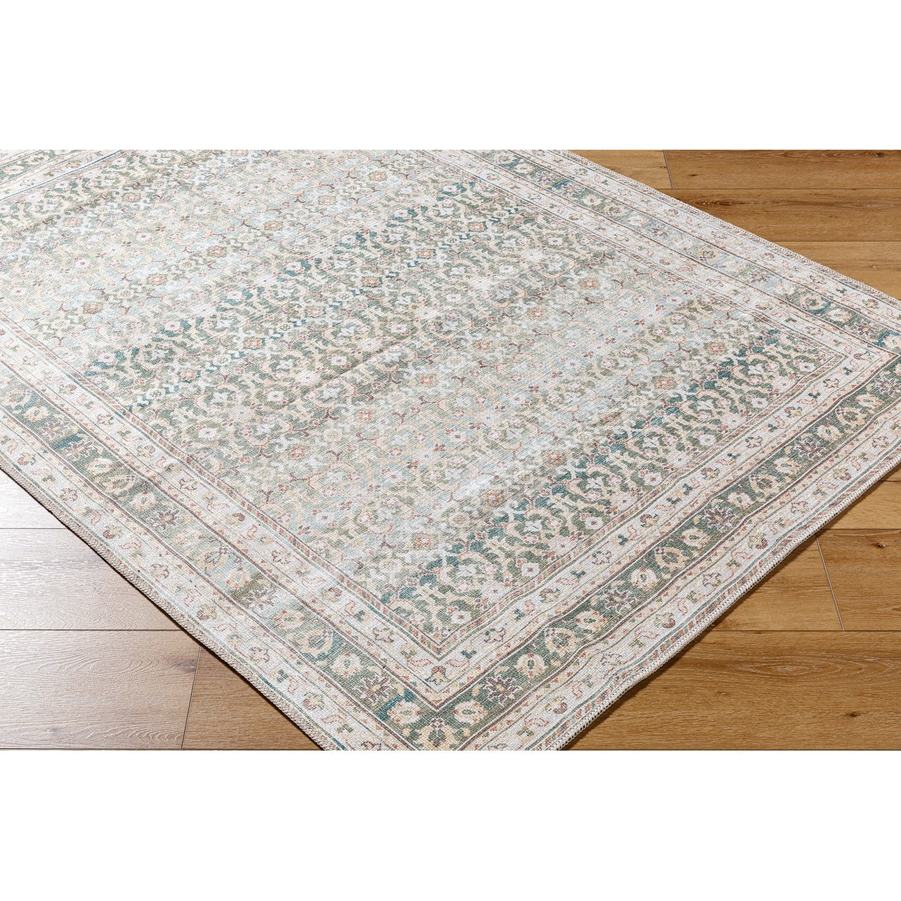ARMITA Our PNW Home x Livabliss Machine Washable Oriental Boho Olive Area Rug Corner