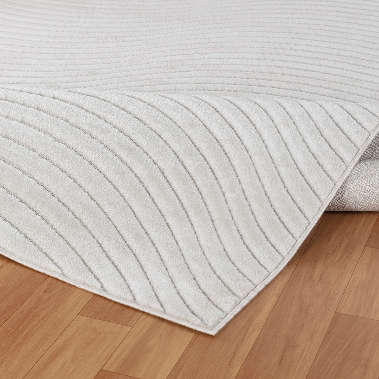 AYUMI Indoor & Outdoor Scandi Modern White Area Rug Fold