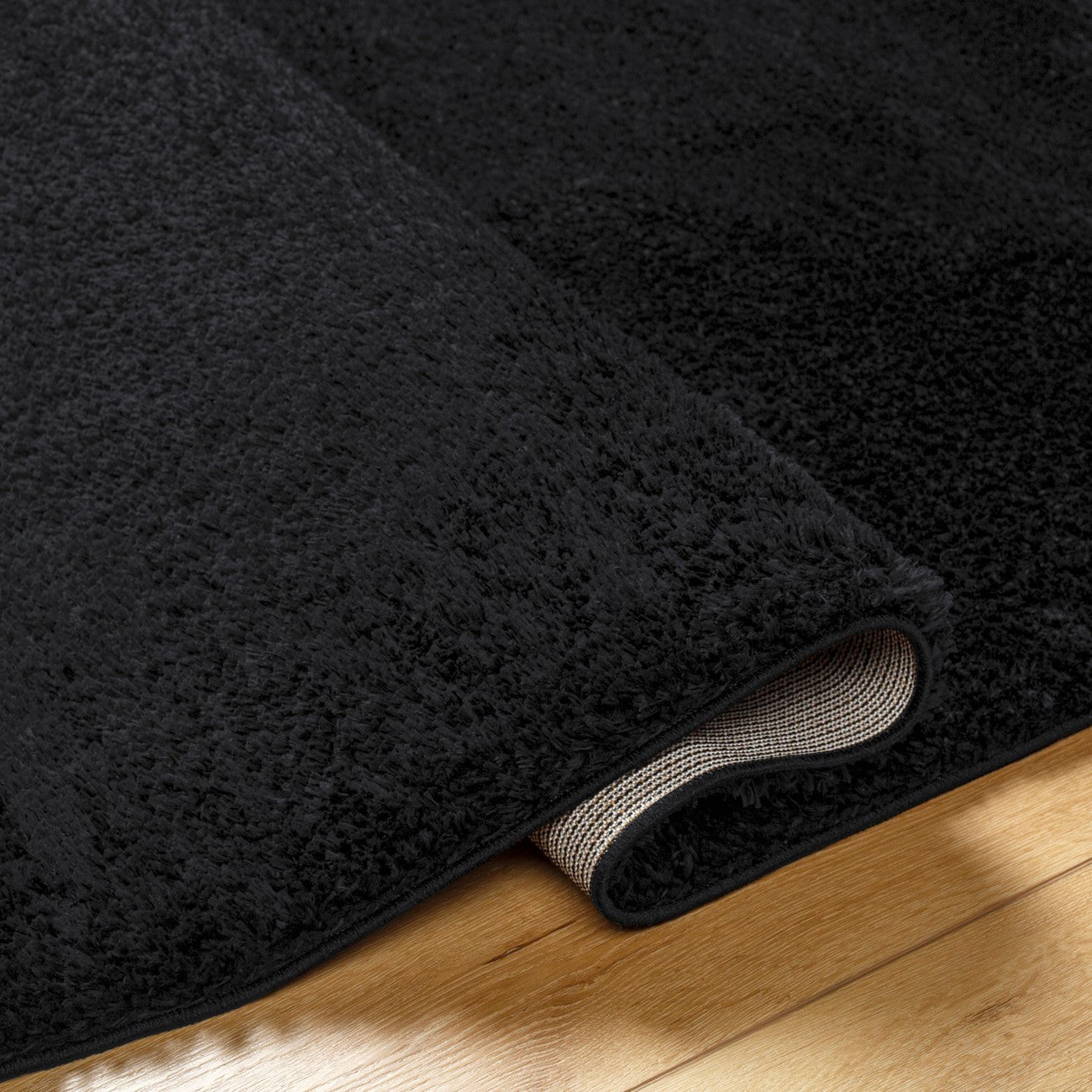 CLAIRE Round Shaggy Solid Color Plush Pile Black Area Rug Black Fold