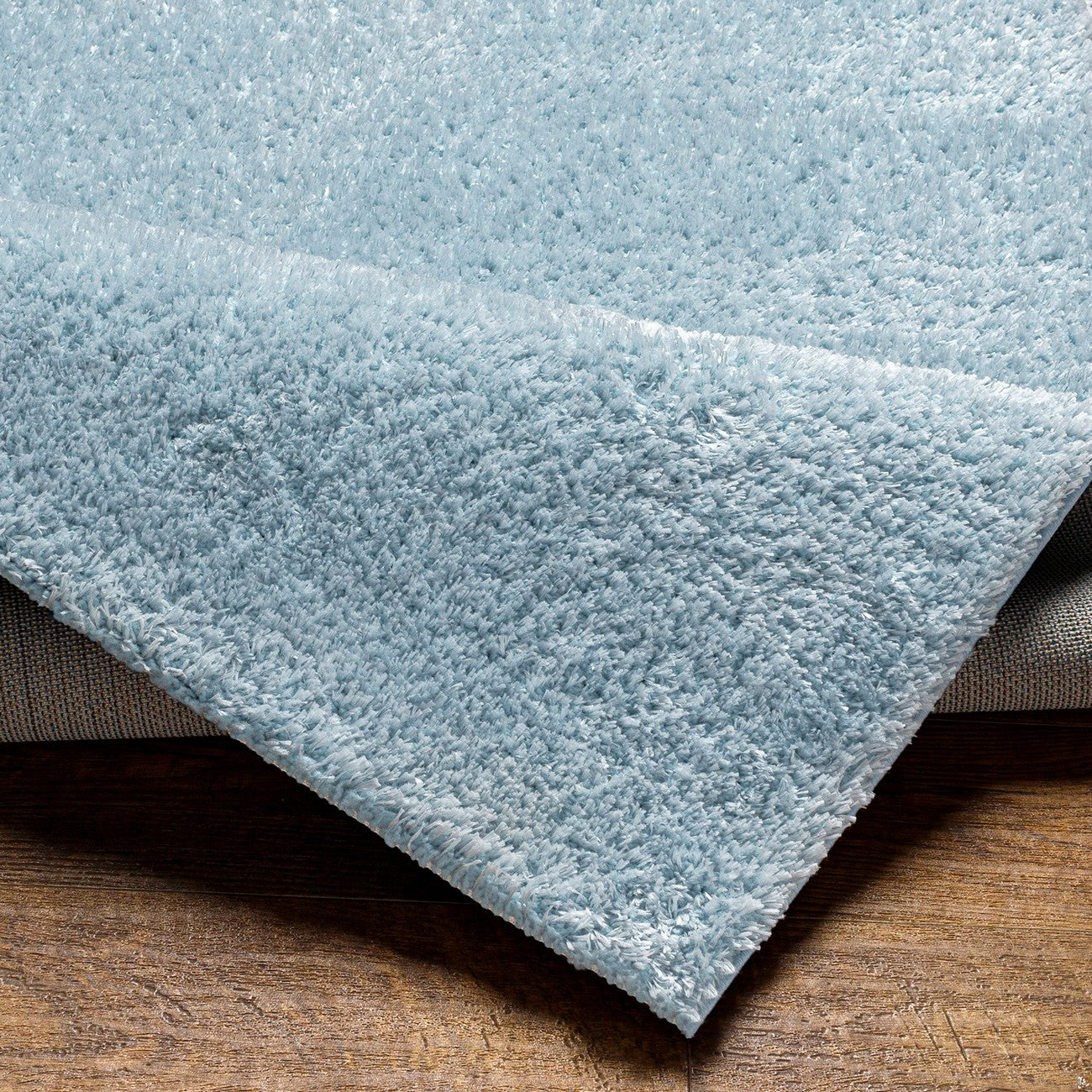 CLAIRE Shaggy Solid Color Plush Pile Denim Area Rug Blue Fold