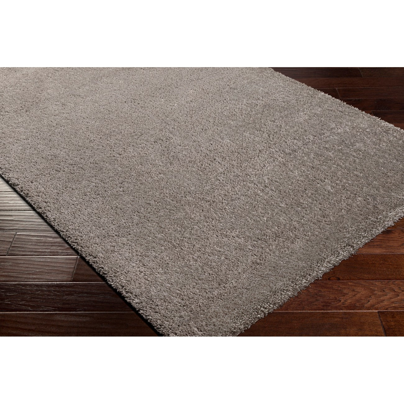 CLAIRE Round Shaggy Solid Color Plush Pile Dark Grey Area Rug Corner