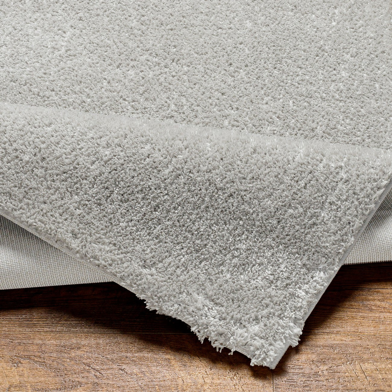 CLAIRE Round Shaggy Solid Color Plush Pile Dark Grey Area Rug Fold