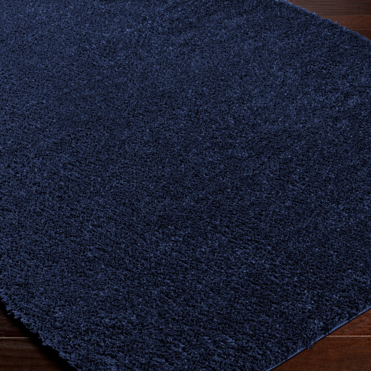 CLAIRE Round Shaggy Solid Color Plush Pile Cobalt Blue Area Rug Corner