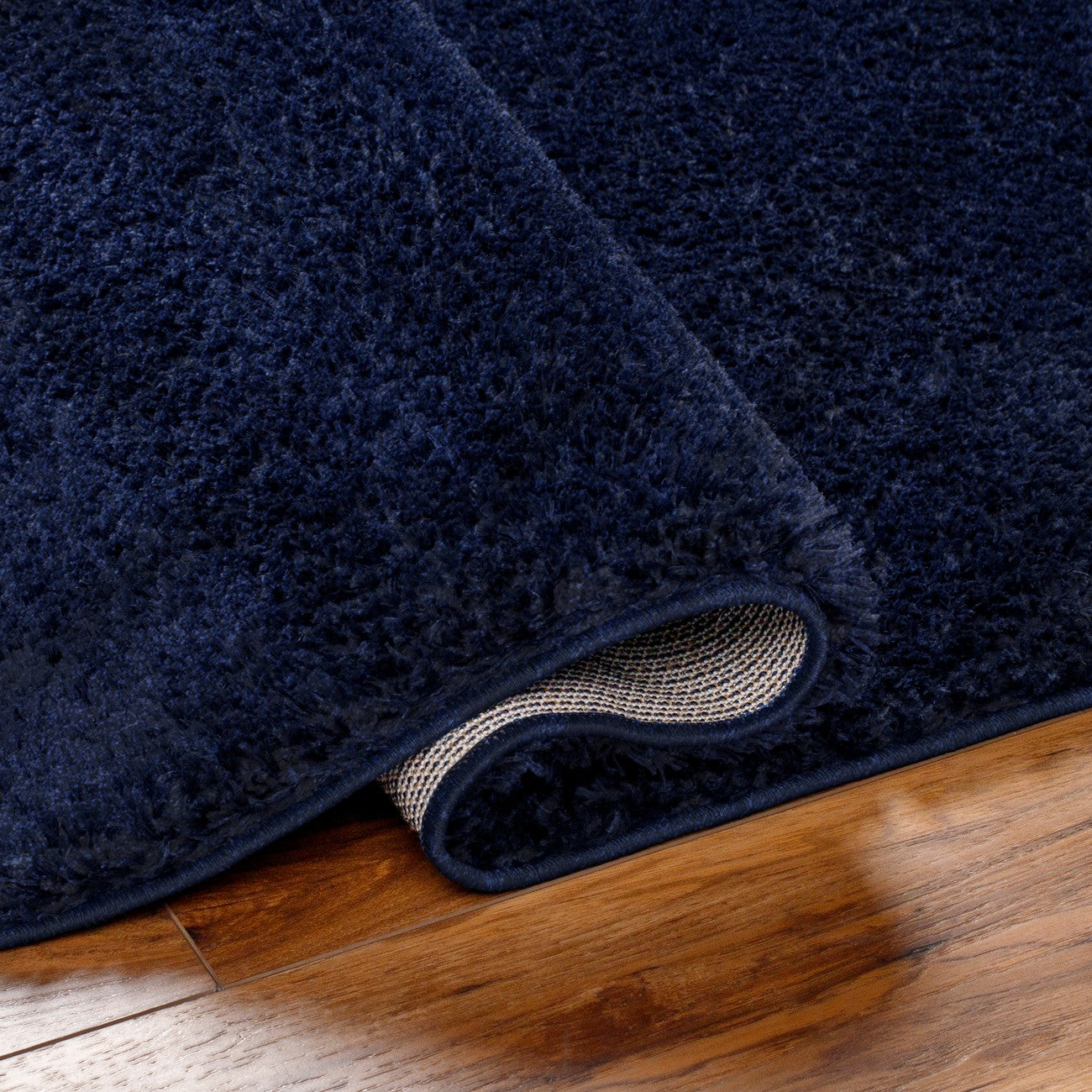 CLAIRE Round Shaggy Solid Color Plush Pile Cobalt Blue Area Rug Fold