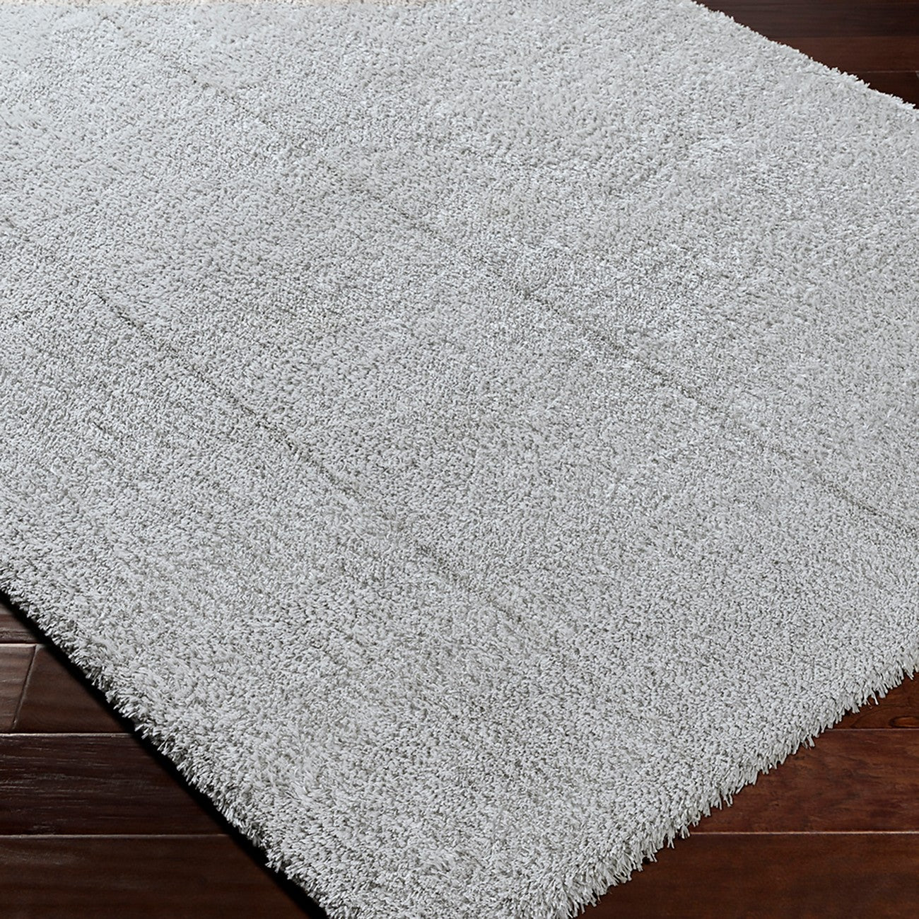 CLAIRE Round Shaggy Solid Color Plush Pile Grey Area Rug Corner
