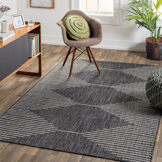 DOLLY Indoor & Outdoor Global Charcoal Area Rug Roomscene
