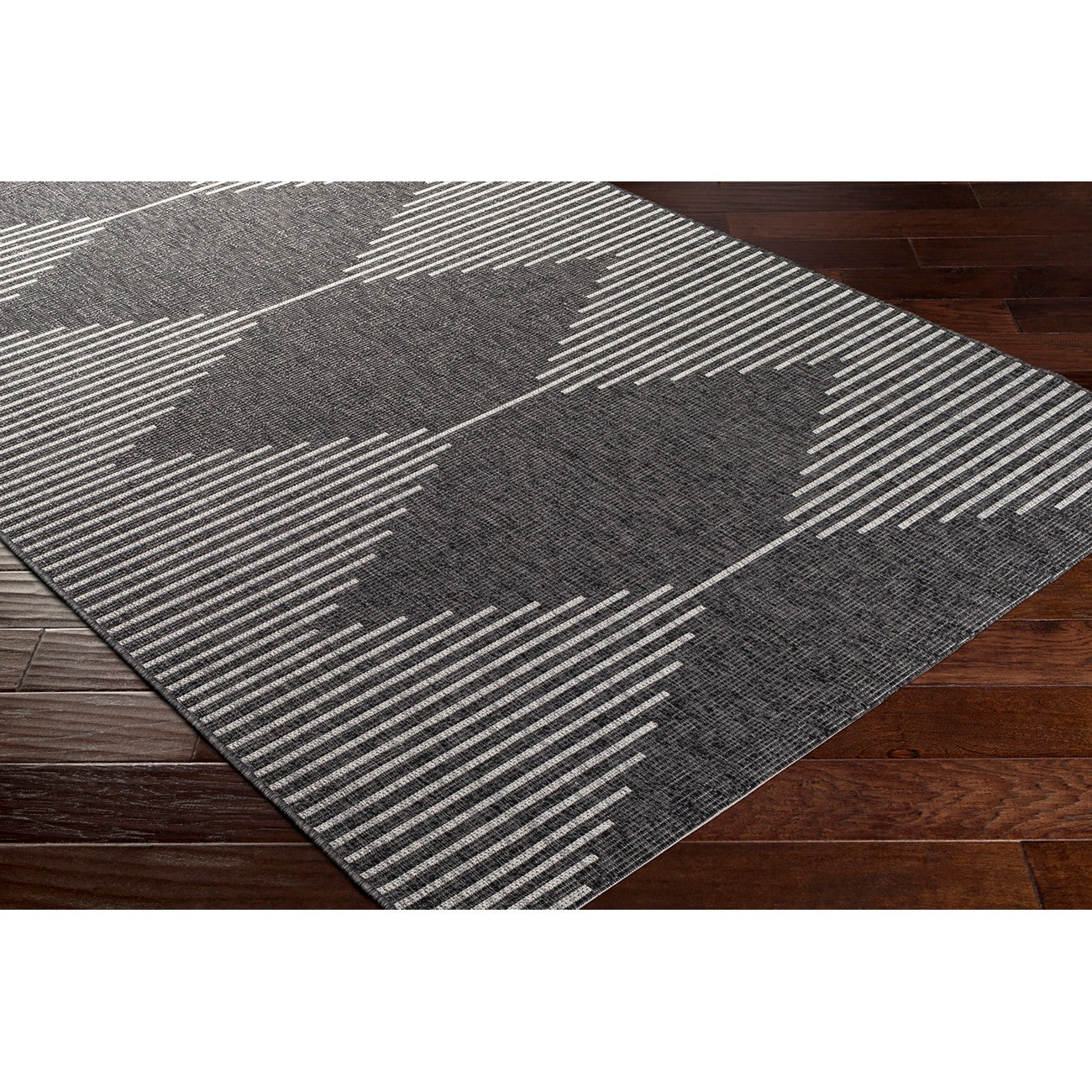 DOLLY Indoor & Outdoor Global Charcoal Area Rug Corner