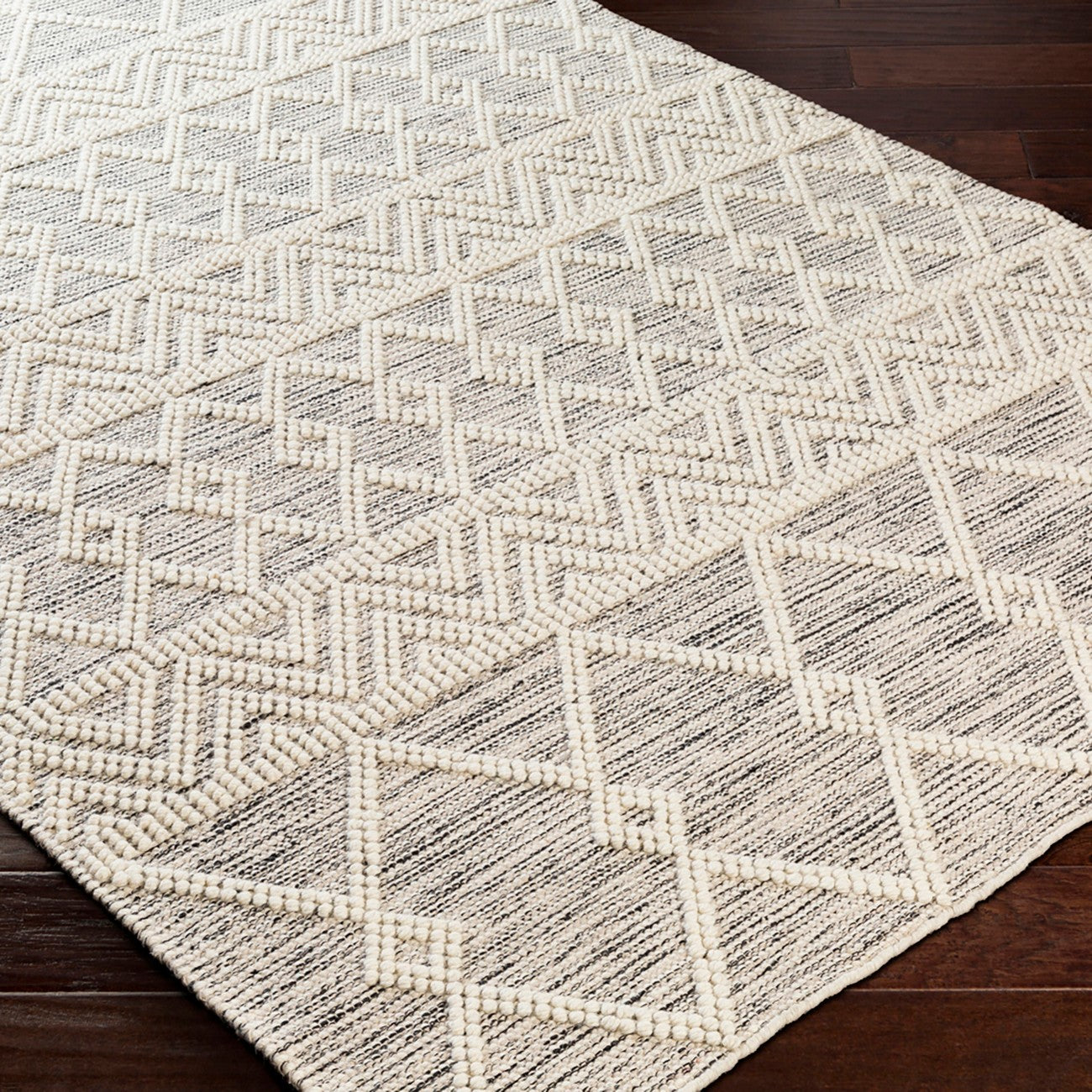 ISHANI Hand-Woven Global Wool Charcoal Area Rug Corner