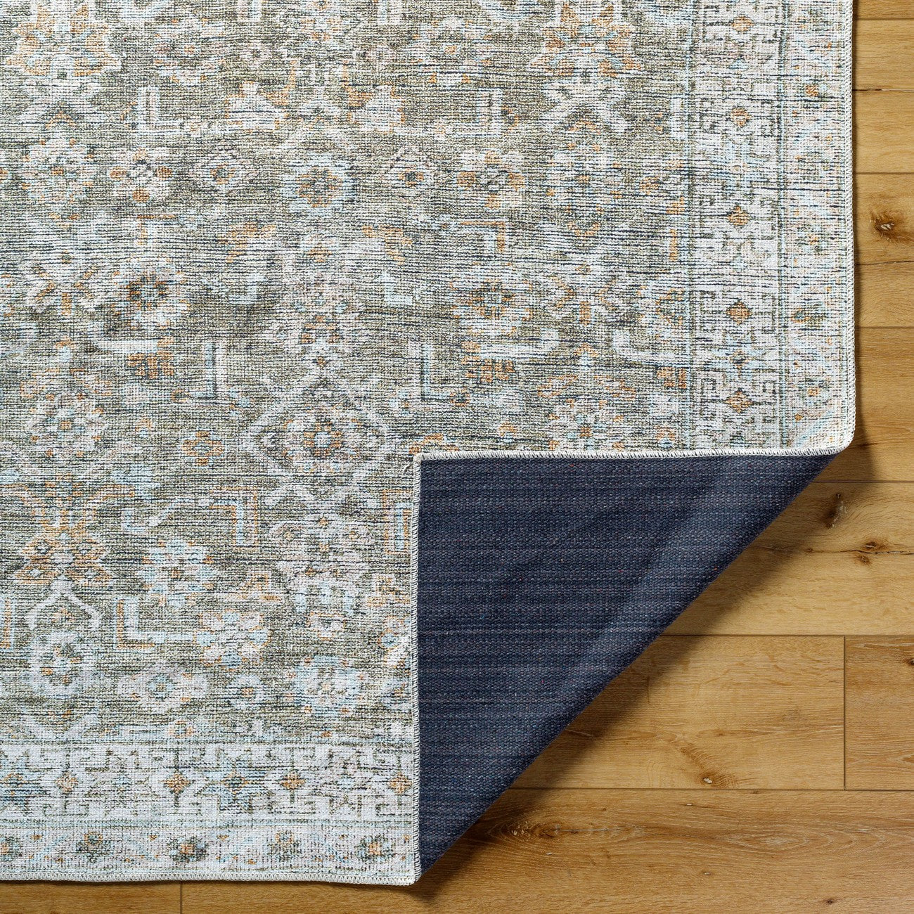 MAHAK Becki Owens x Livabliss Machine Washable Oriental Boho Khaki/Light Silver Area Rug Fold