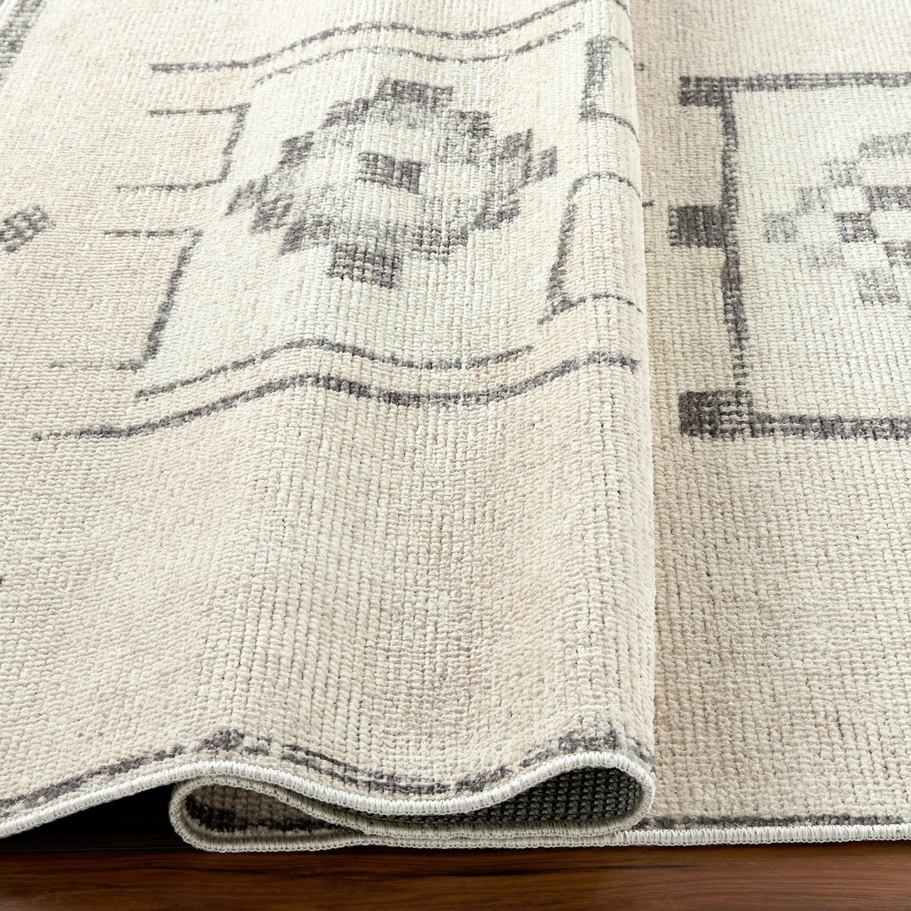 MAMTA Becki Owens x Livabliss Global Berber Charcoal/Beige Area Rug Fold