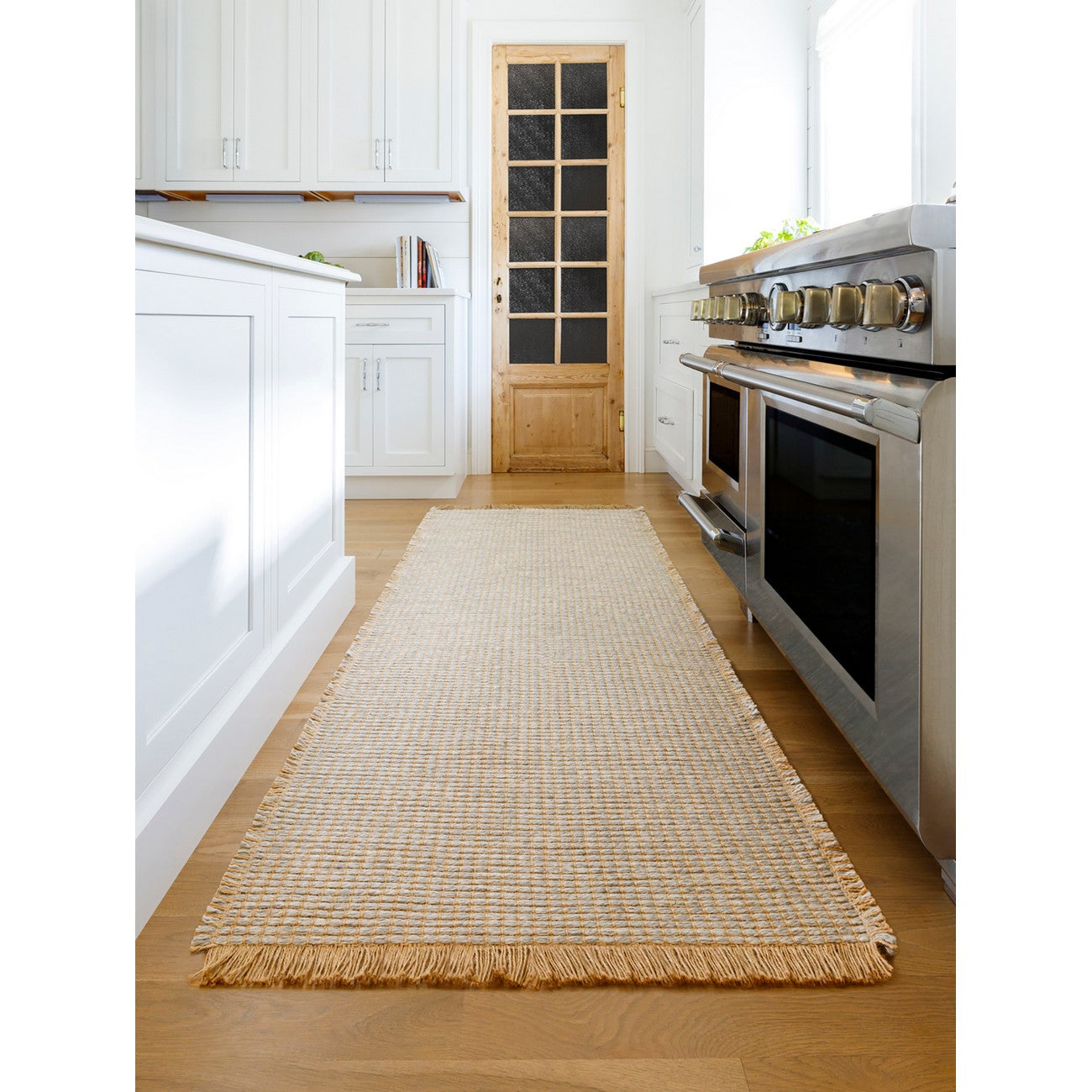 PAVI Becki Owens x Livabliss Solid and Border Grey Jute Area Rug Roomscene