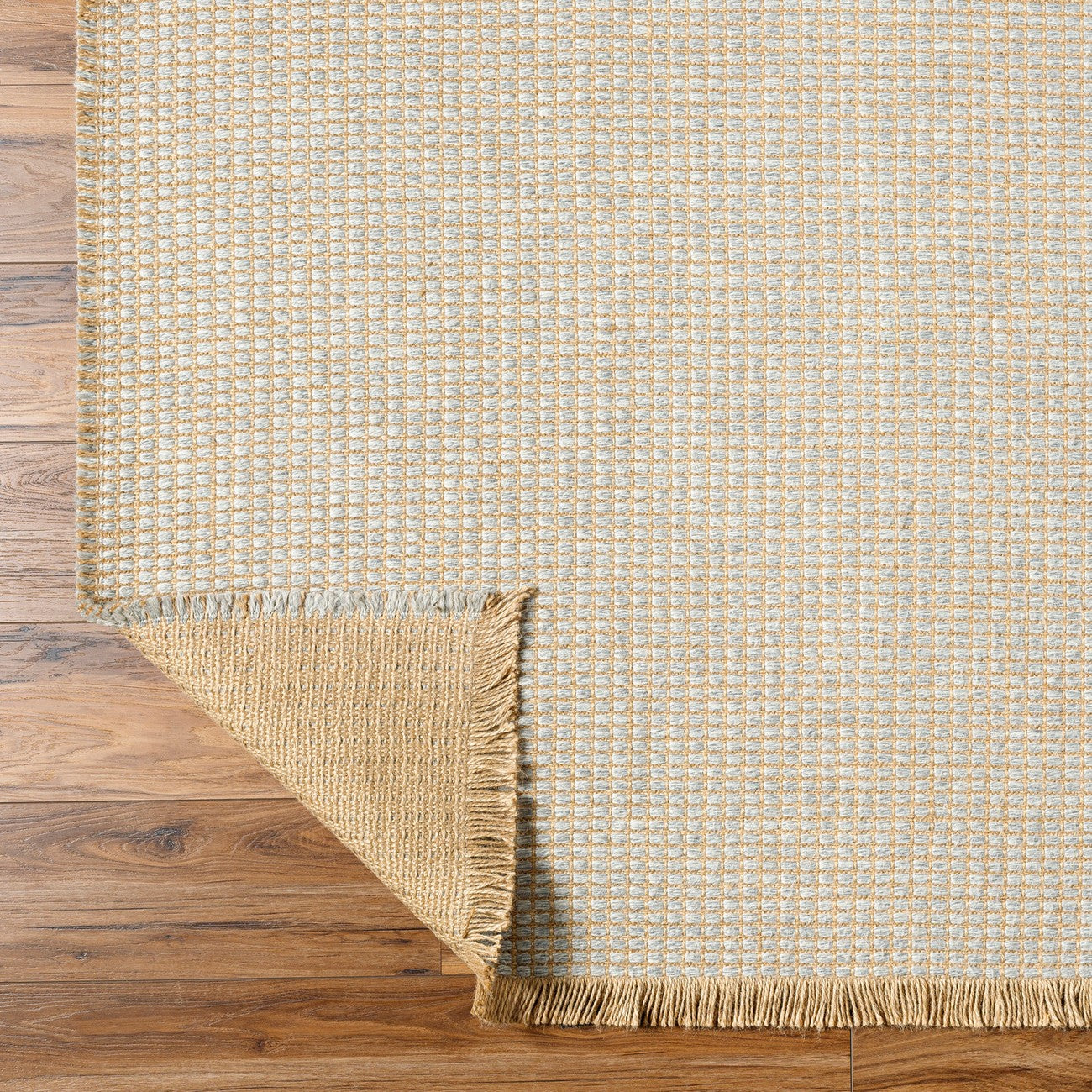 PAVI Becki Owens x Livabliss Solid and Border Grey Jute Area Rug Fold