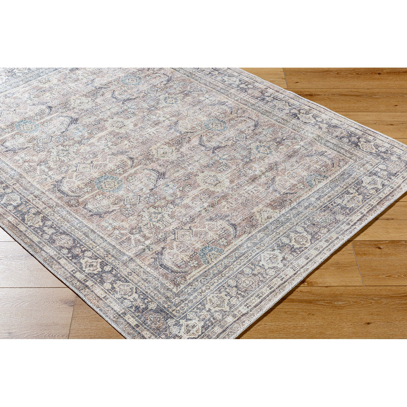 SHALINI Becki Owens x Livabliss Machine Washable Oriental Boho Light Silver Area Rug Corner