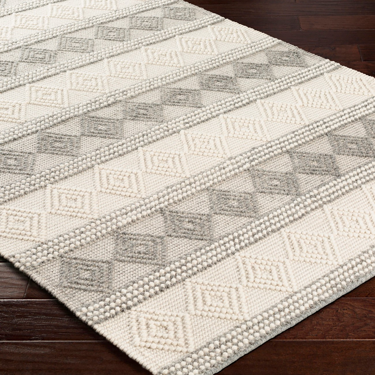 TARINI Hand-Woven Cottage Wool Charcoal Area Rug Corner